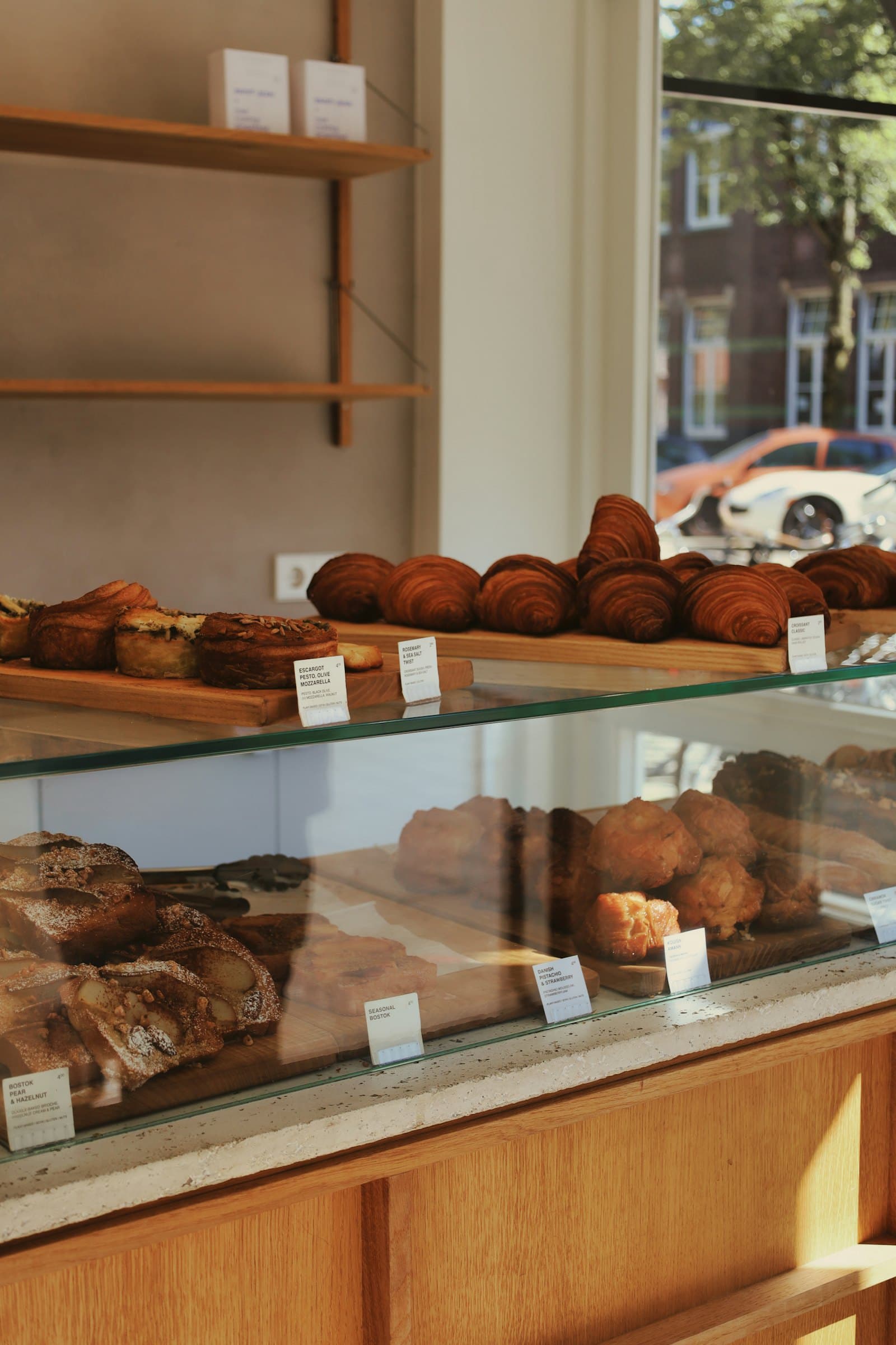 Croissants and pastries in the glass counter